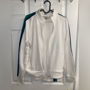 Two Piece Tory Sport sweatsuit. Size large Jacket/ Medium pants.